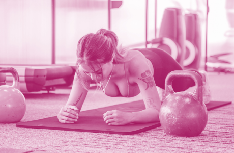 Sexy Woman Exercising at the Gym
