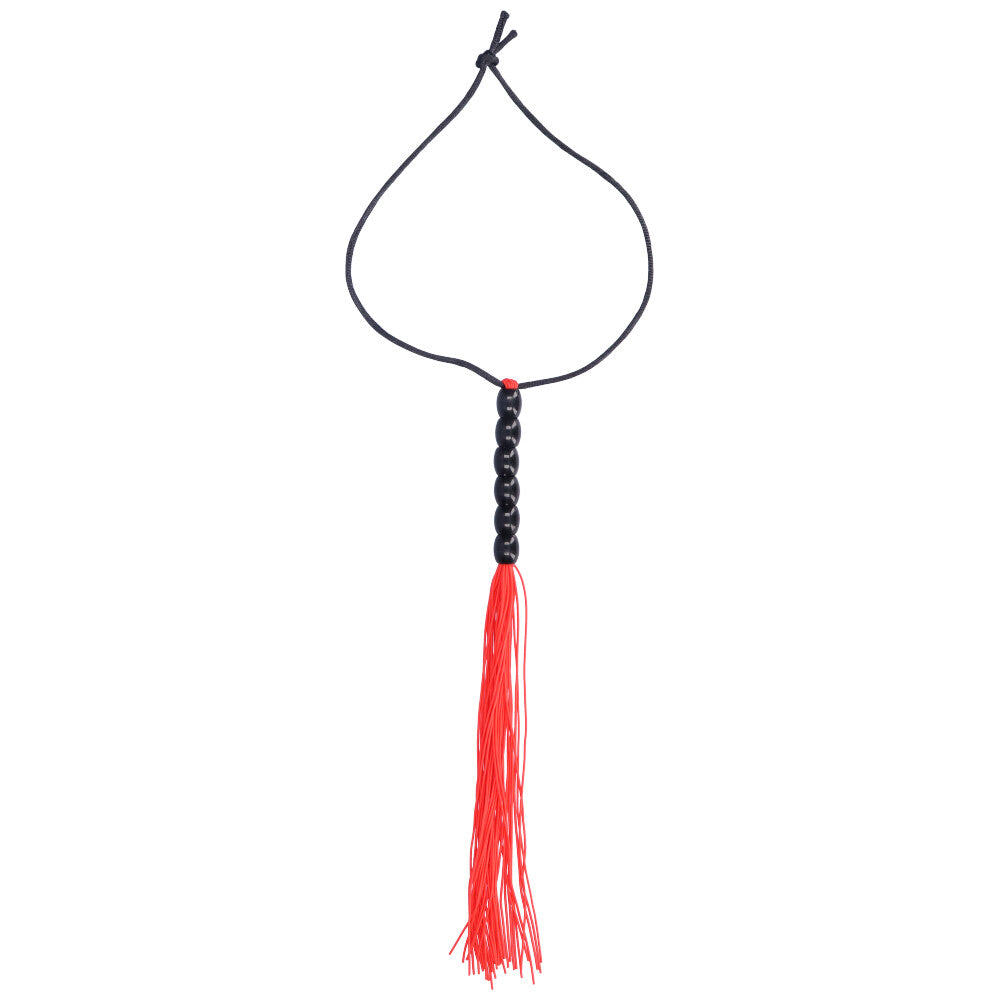 Red flogger with black beaded handle.