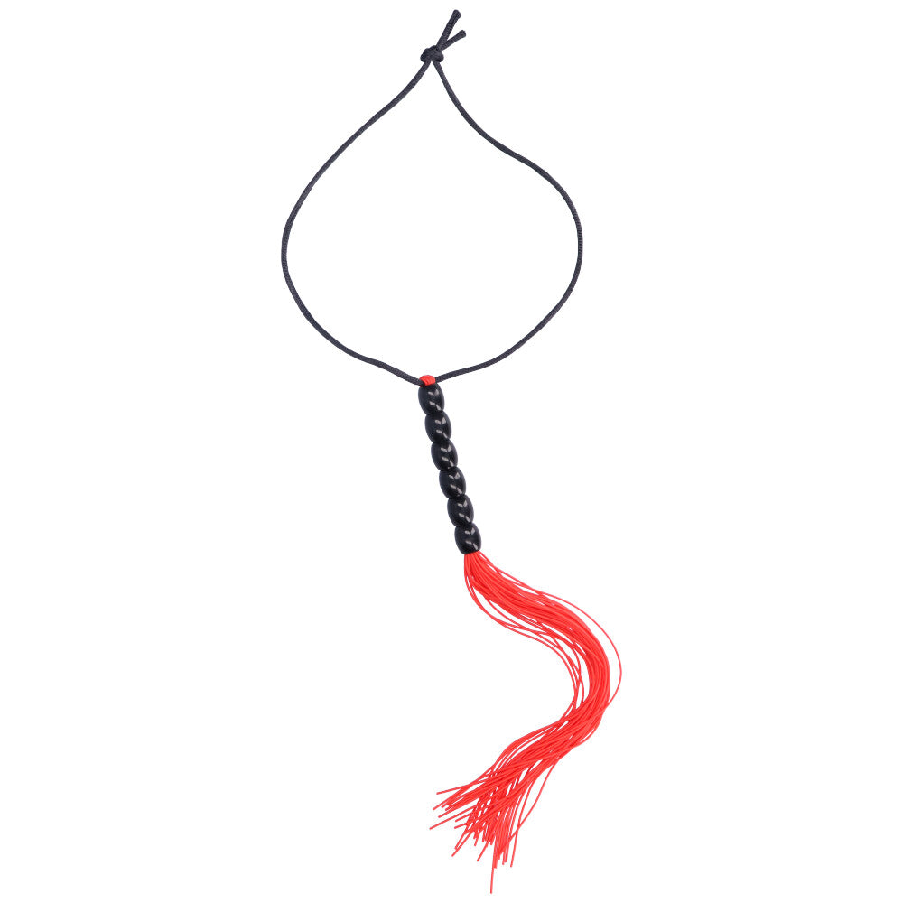Alternate view of red flogger with black beaded handle.