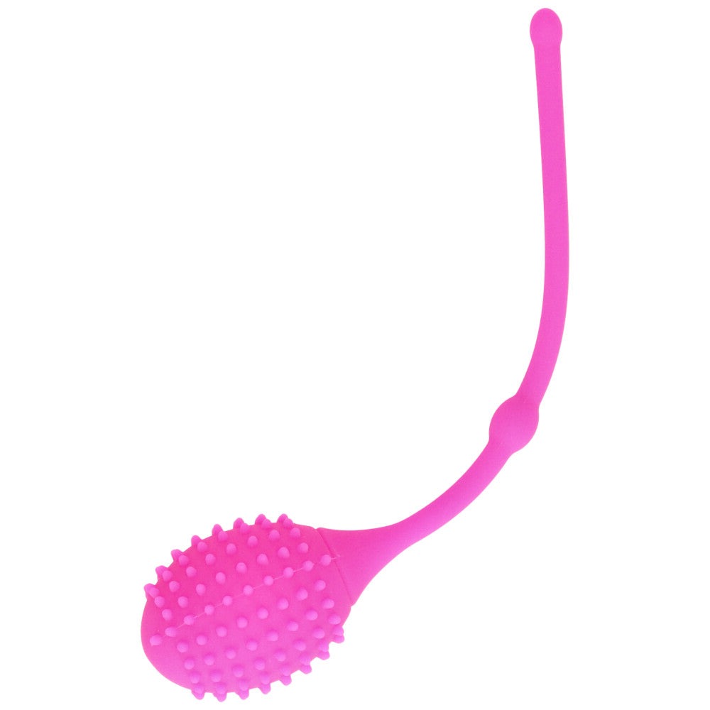 Bird's eye view pink silicone textured kegel ball with retrieval cord.