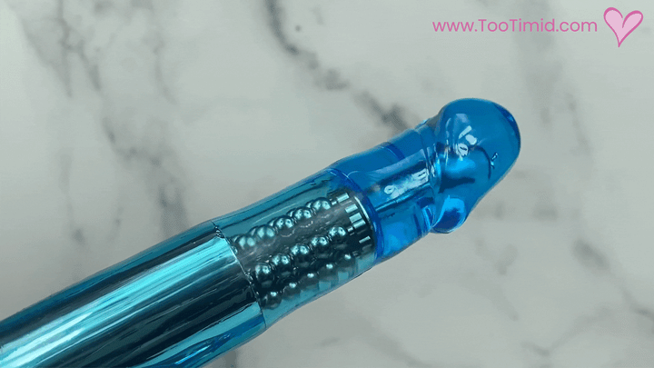 GIF of 5 rows rotating beads in blue rabbit vibrator
