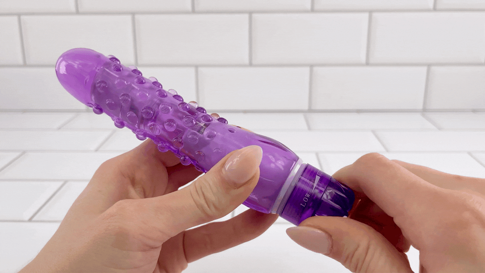 GIF of Nubby Waterproof Vibrator for Beginners being turned on with twist dial