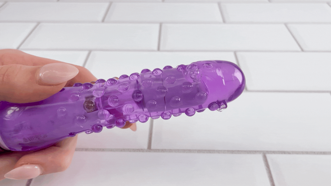 GIF of lubricant vibrating off of Nubby Waterproof Vibrator for Beginners