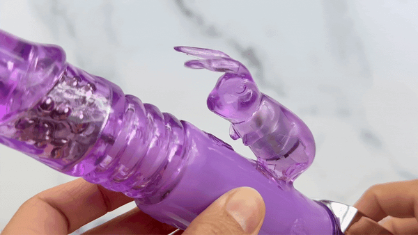 GIF of bunny from Thrusting purple rabbit vibrator with fluttering ears