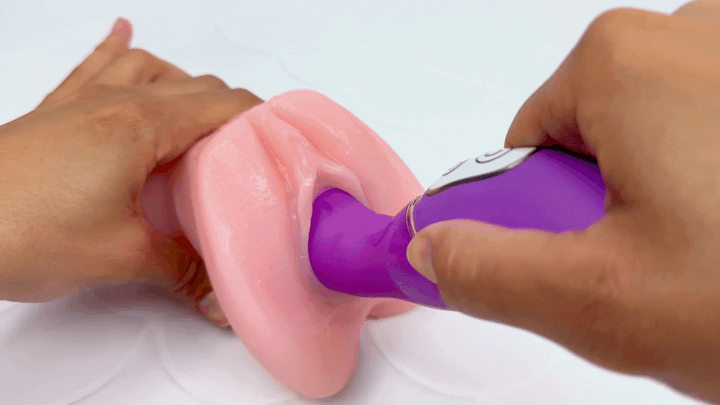 GIF of clit teaser thrusting in and out of a model of a vagina