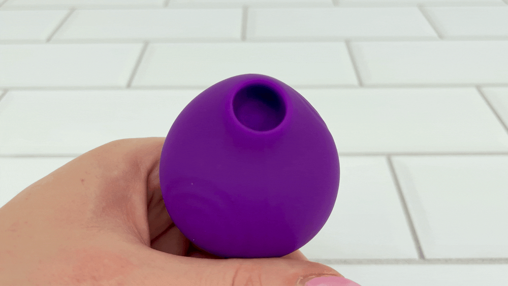 GIF of KISS Mini Air Pulse Clit Kissing Vibrator on fast setting