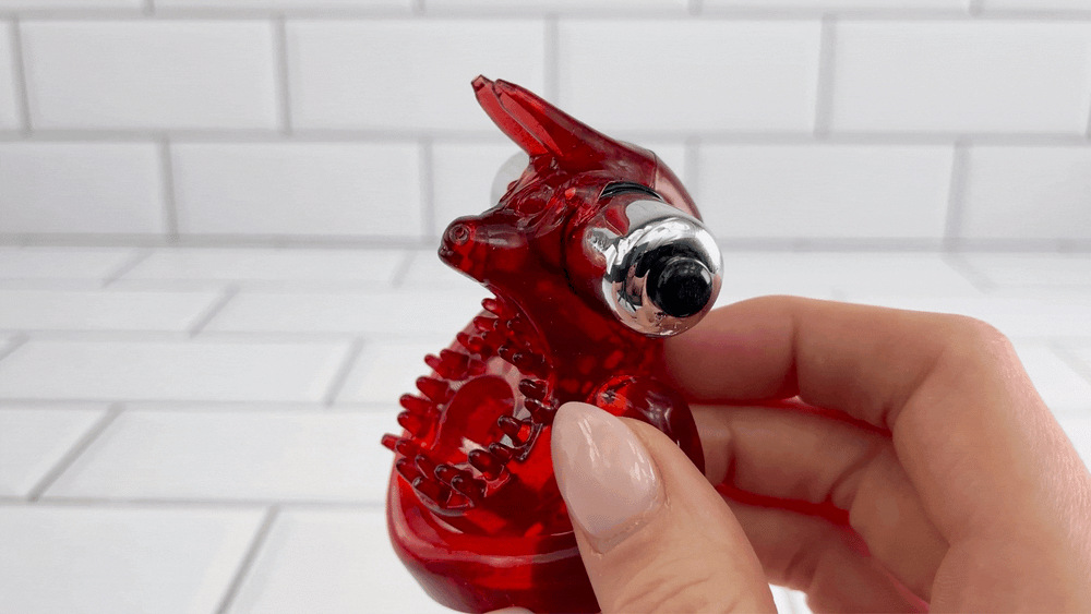 GIF of red jelly couples c-ring vibrating