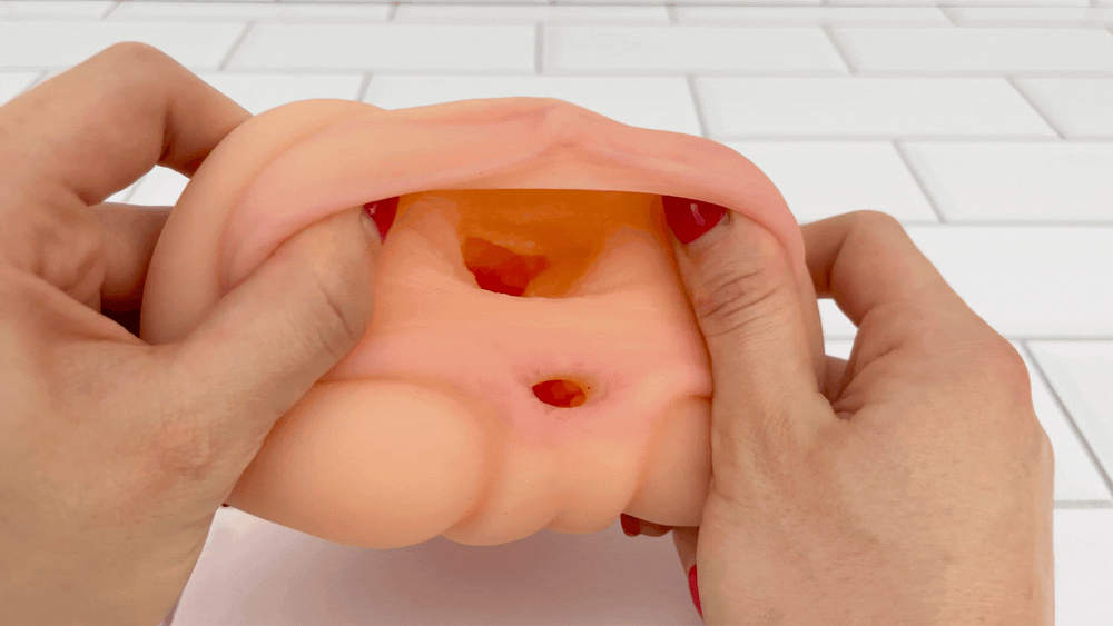 GIF of vaginal opening from Realistic Easy Grip Dual Entry Pussy & Ass Masturbator being stretched