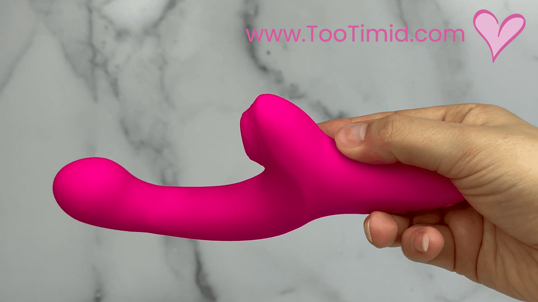 GIF of duel pink vibrator showcasing fingering from side view
