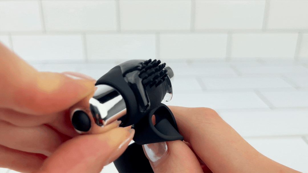 GIF of thick lubricant on vibrating Beaded Double Penetration Clit Stimulating Vibrating Cock Ring