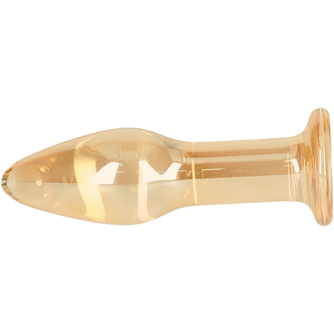 side view of amber glass tapered anal plug