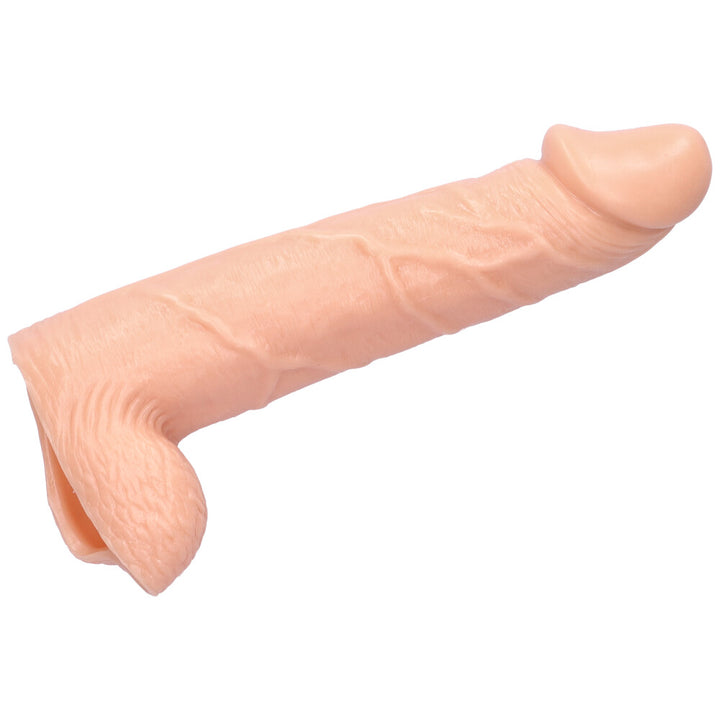 Realistic penis extender with balls facing left showing veined shaft and detailed penis head