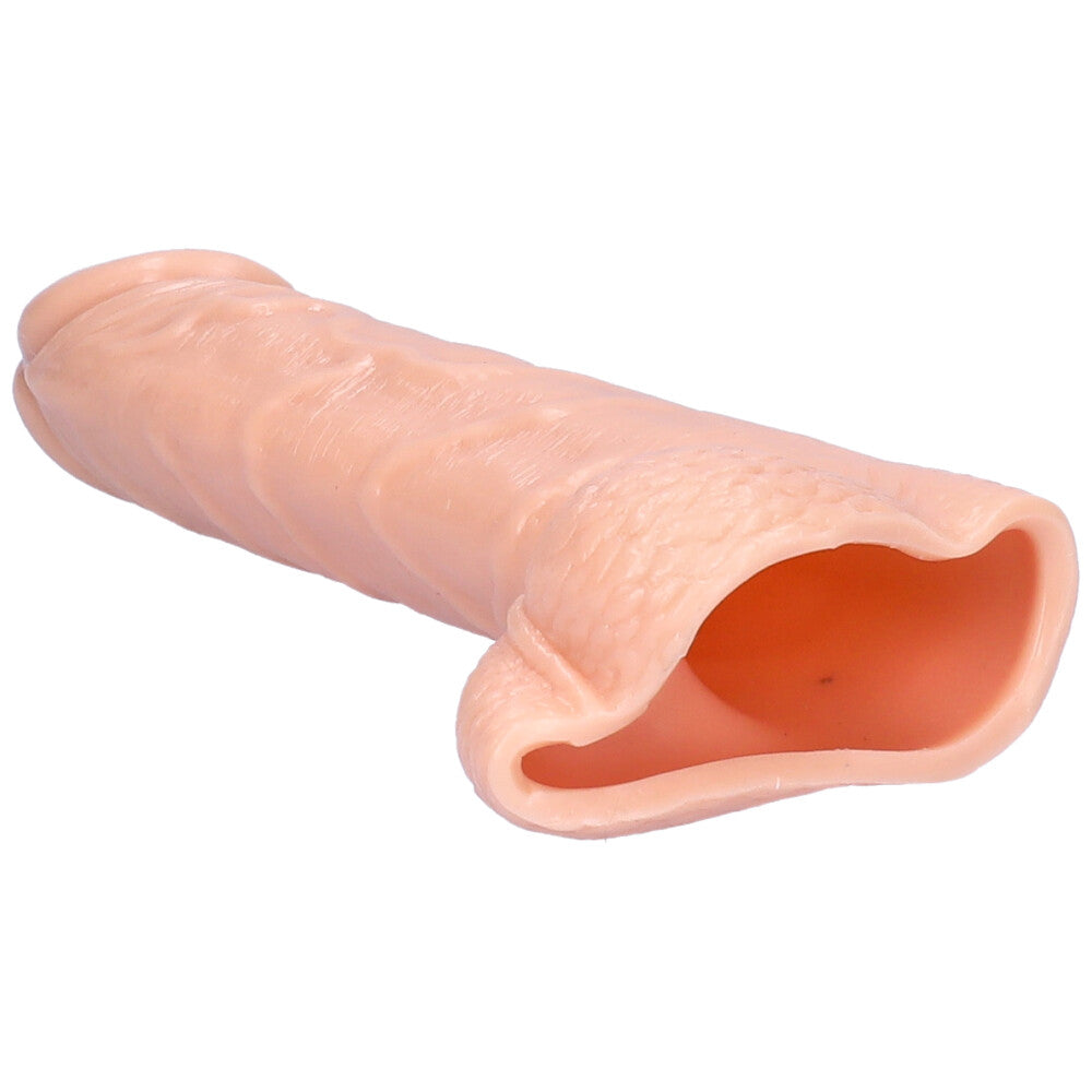 Realistic penis extender with balls showing the hollow interior