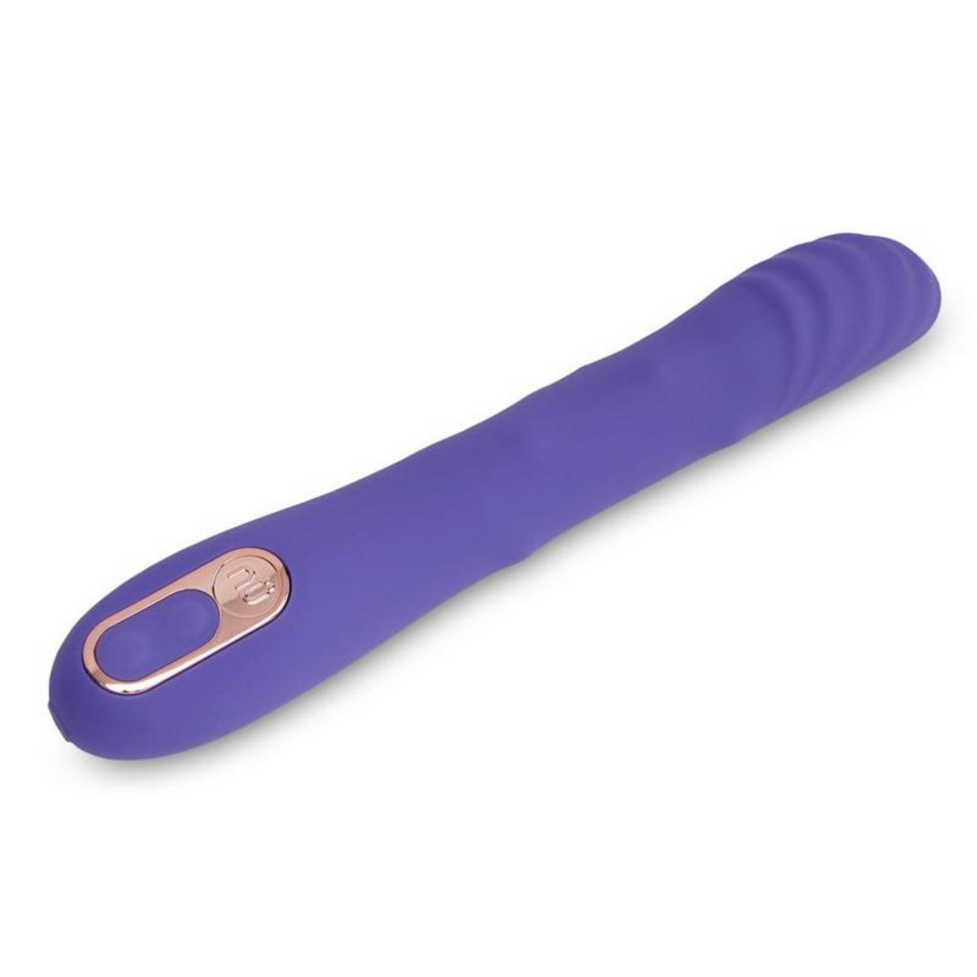 Nu Sensuelle Roxii Rechargeable Silicone Wand with Roller Motion  showing the product with the moving beads, ripples and the control panel.