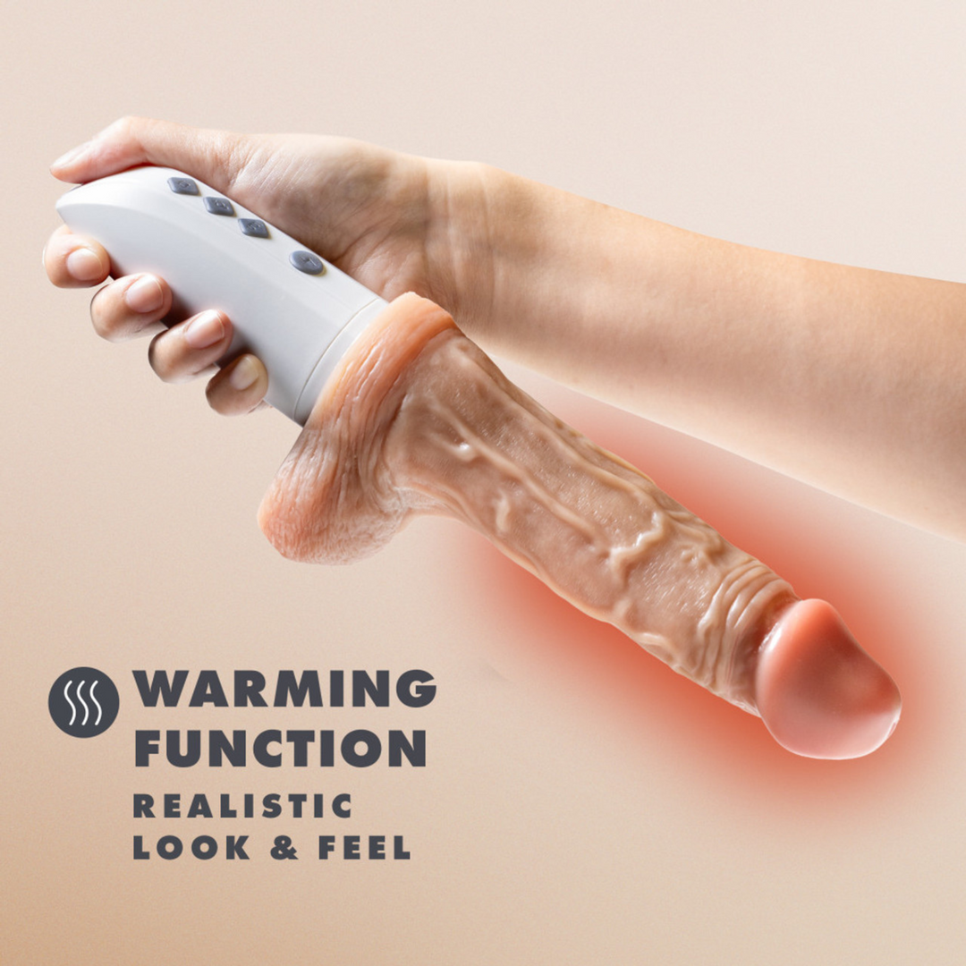 Dr. Hammer Rechargeable Thrusting Dildo with Handle and Remote Control image of product being held showing the warming function.