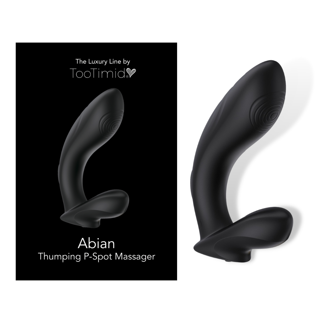 black p-spot vibrator laying next to its packaging