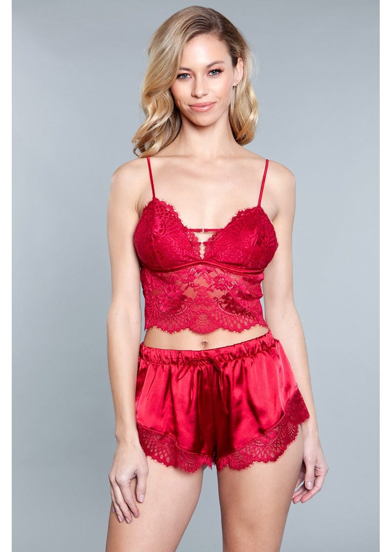 Red satin crop top and shorts with lace trim.