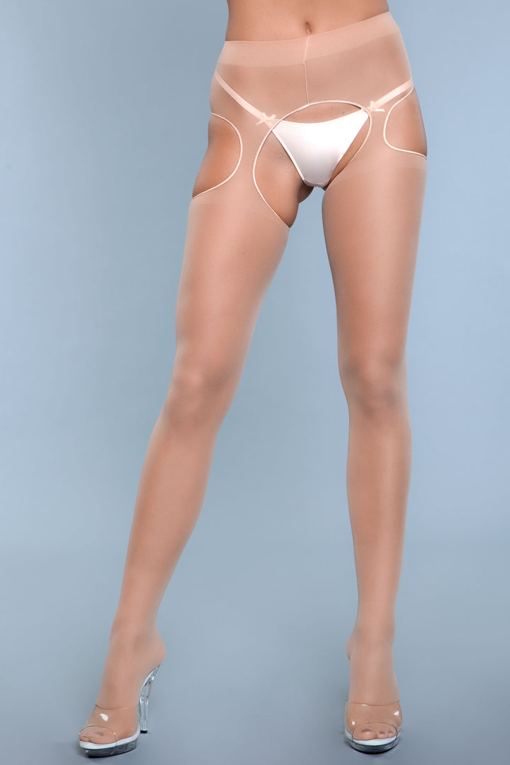 Model facing forward wearing beige sheer suspender pantyhose