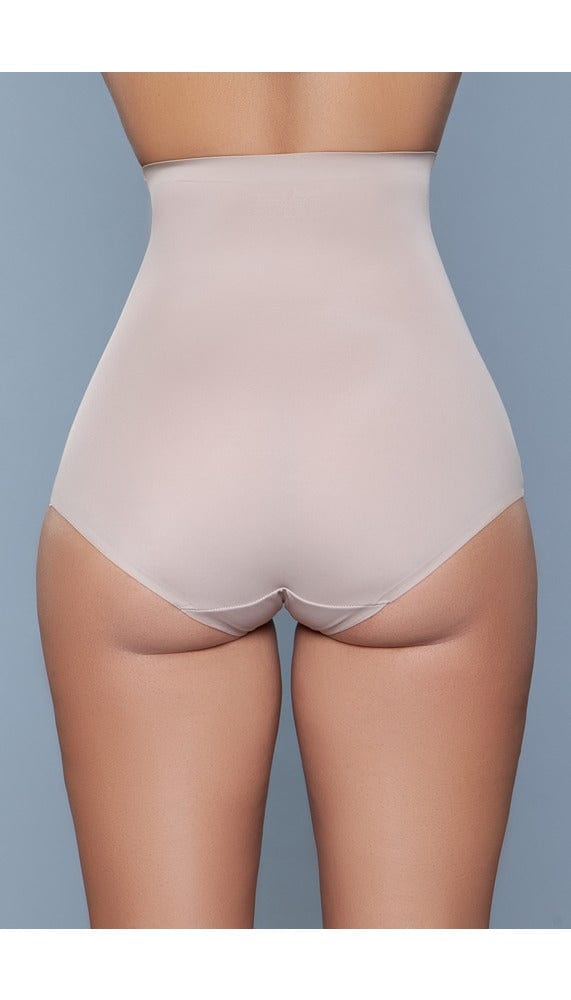 Model wearing seamless high-waisted tummy control body shaper in beige facing back close up