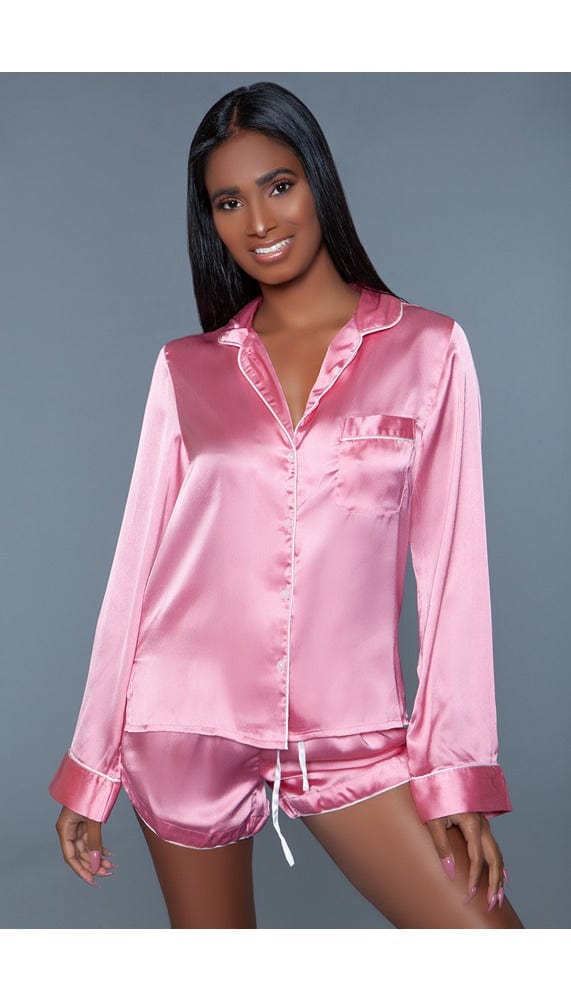 Model wearing 2 pc satin pajama set with revere collared top and stretch waist bottoms facing forward