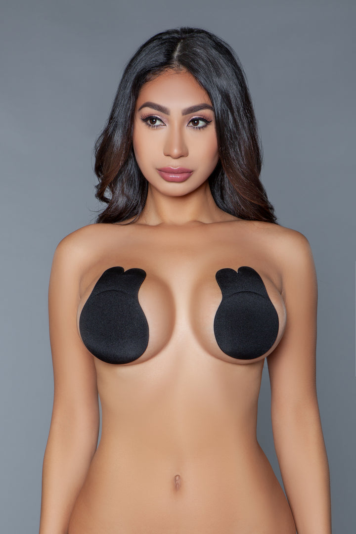 Model facing forward wearing black bunny nipple covers