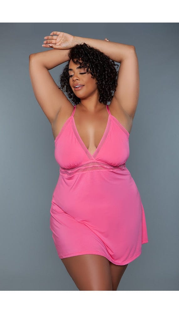 Pink babydoll mini dress with plunging v-neck.