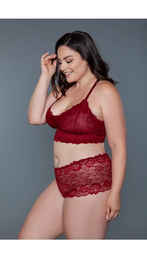 Side view of red lace cami set.