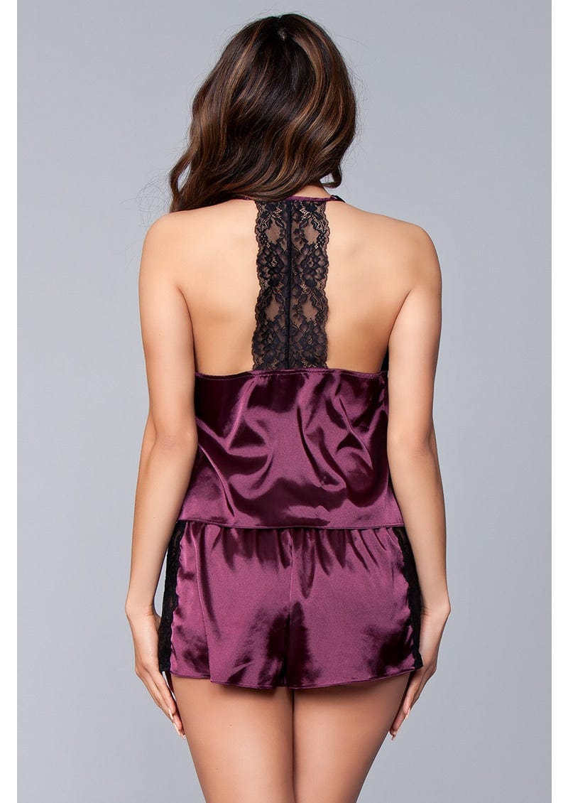 Back view of cami set with vertical strip of black lace going down center of back.