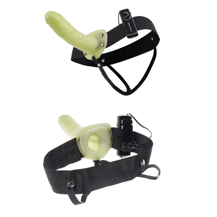 Detailed image of the black sex harness and green glow in the dark realistic hollow vibrator