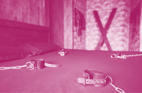 full body bondage bed set with spreader in the background 