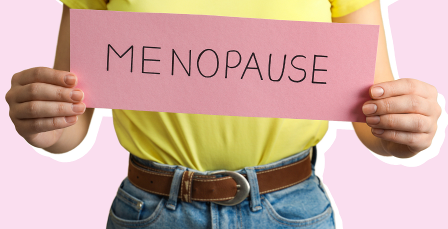 Woman holding menopause sign