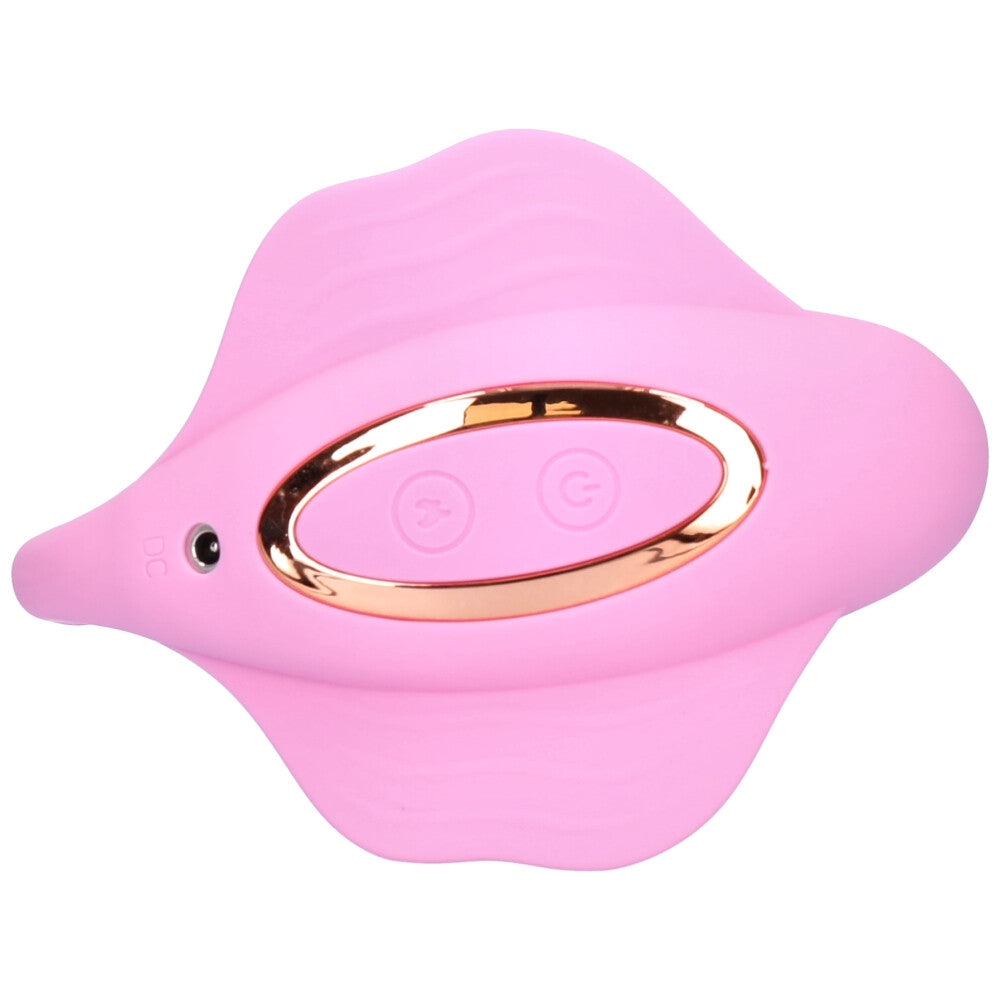 Wearable triple stimulation vibrator from bottom showing controls and charging port