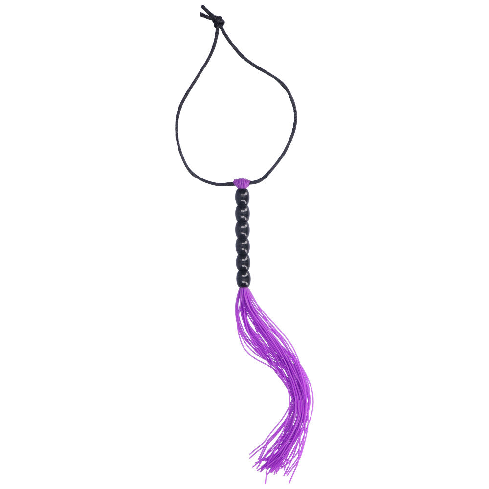 Alternate view of purple flogger with black beaded handle.