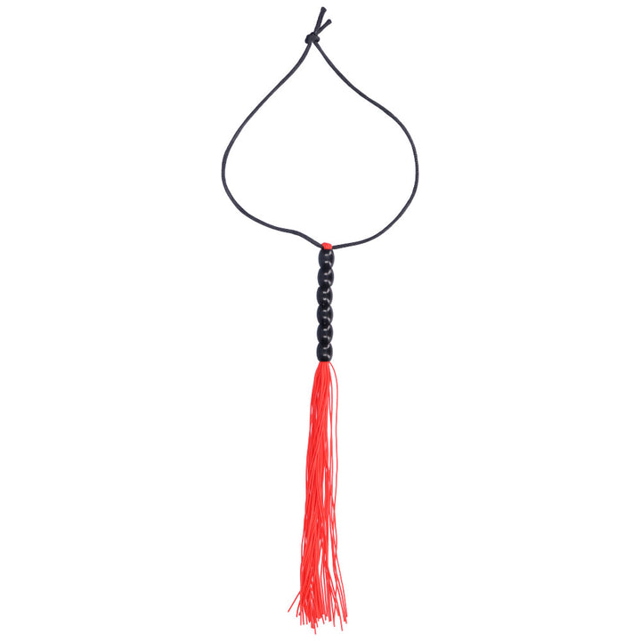 Red flogger with black beaded handle.