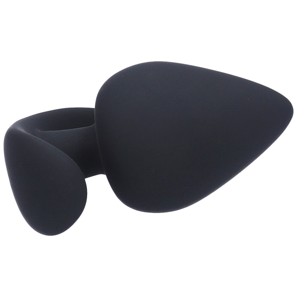 Side view of large black silicone anal plug with a tapered tip and flared base.