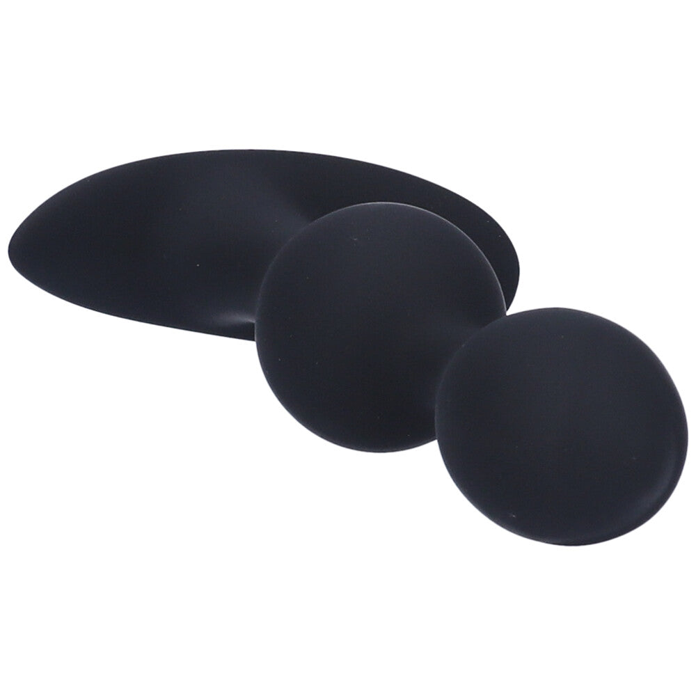 Angled top view of the black silicone bulbed anal plug.