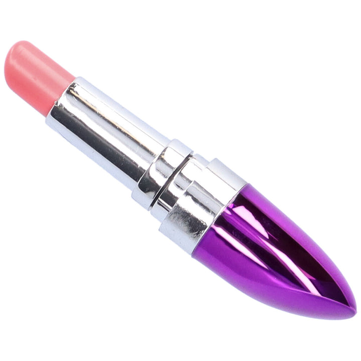 Bird's eye view of purple discreet lipstick vibe with cover taken off.