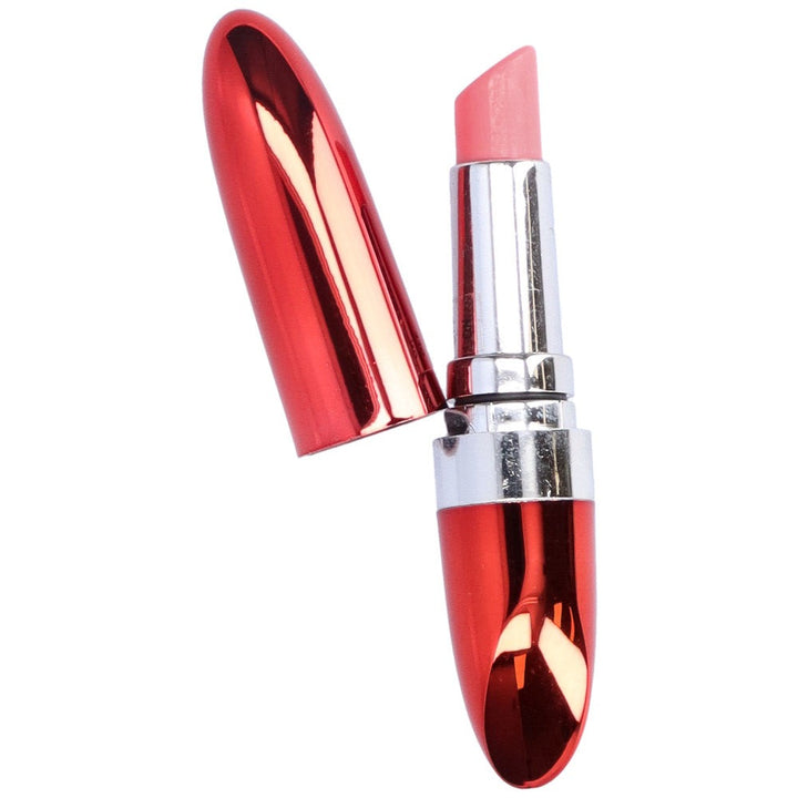 Bird's eye view of red discreet lipstick vibe with cover taken off and at its side.