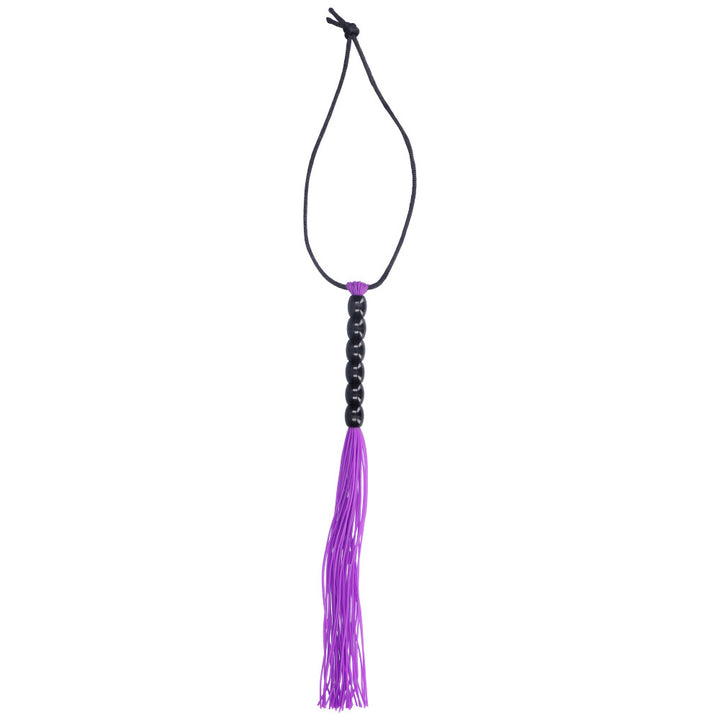 Purple flogger with black beaded handle.