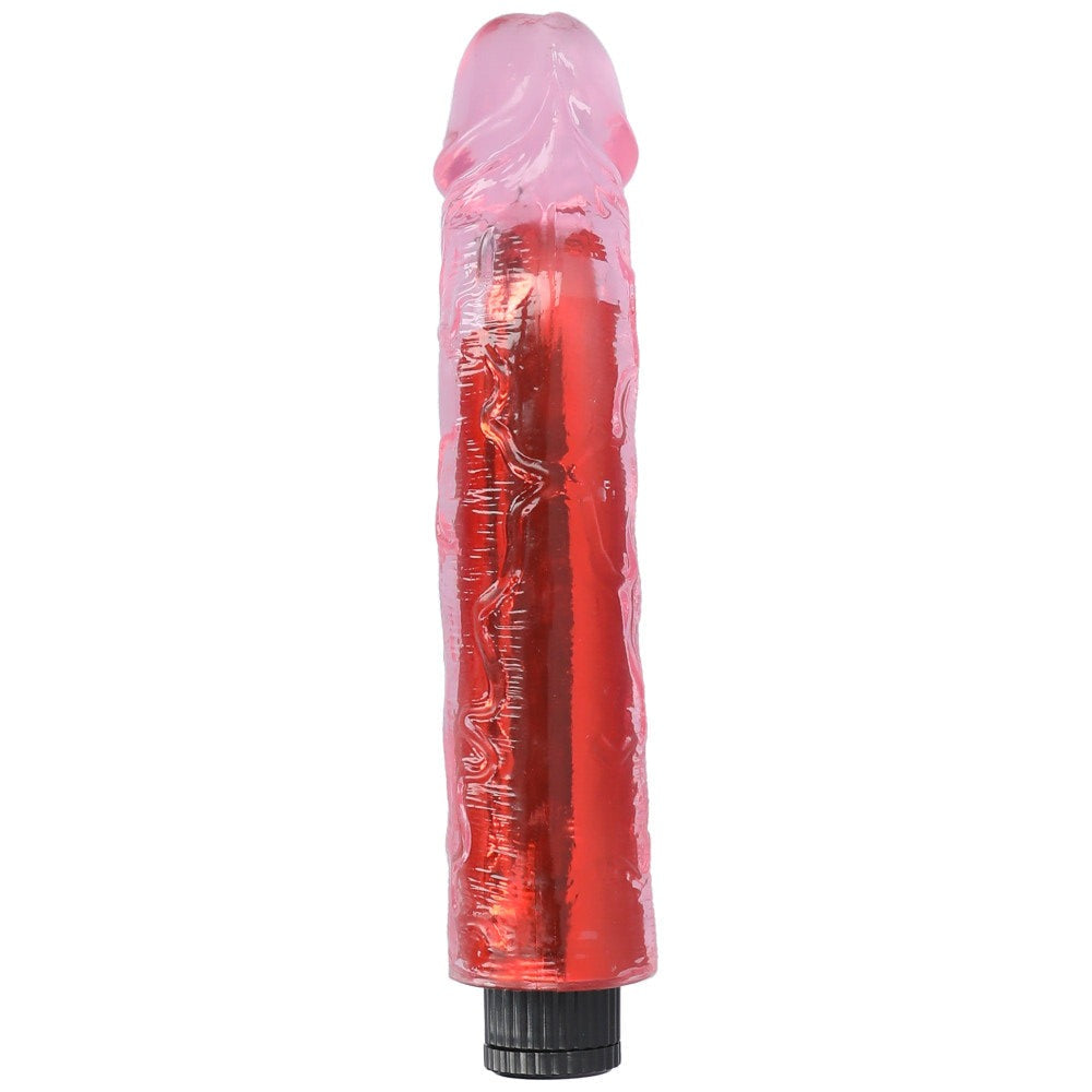 Pink 8" vibrating dildo standing up showing the bottom side of the shaft.