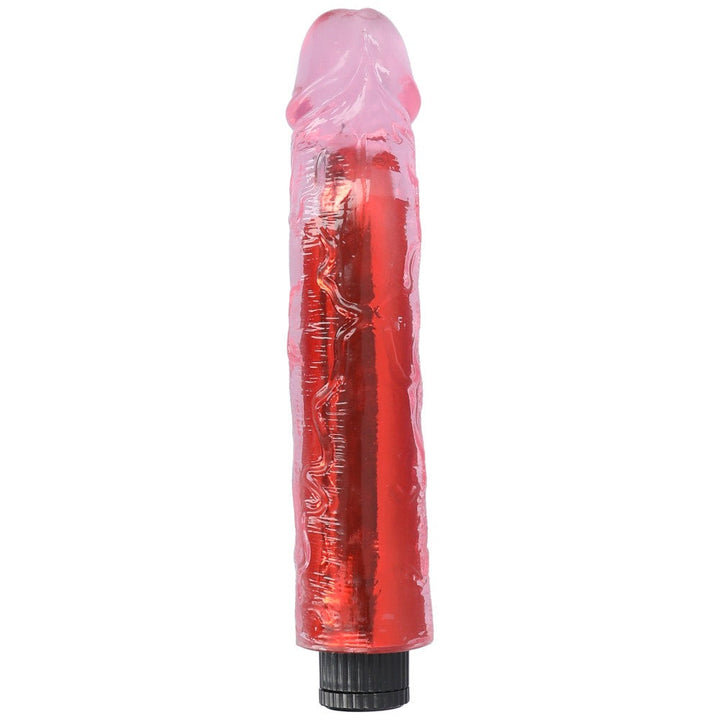 Pink 8" vibrating dildo standing up showing the bottom side of the shaft.