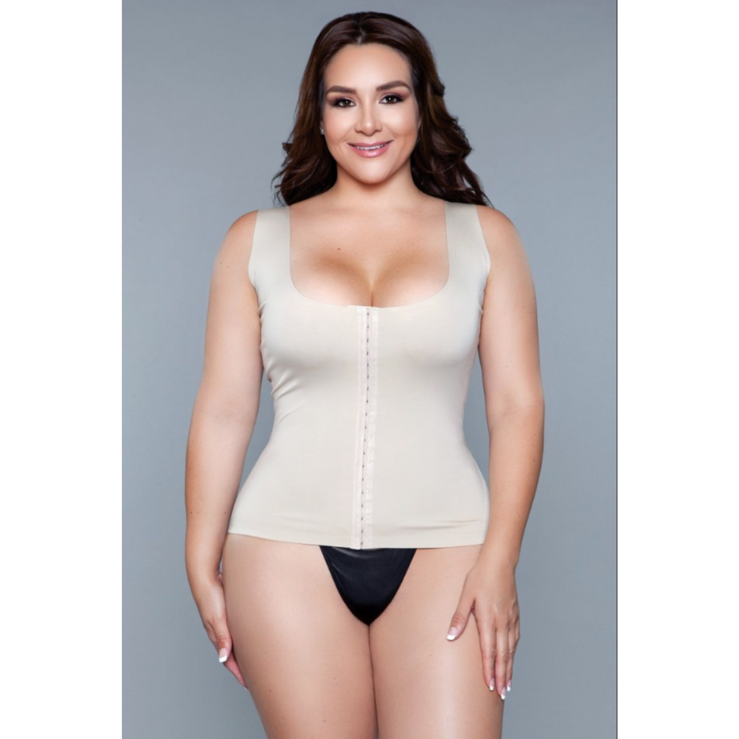 Model wearing seamless top bodyshaper with hook and eye closure in beige facing forward