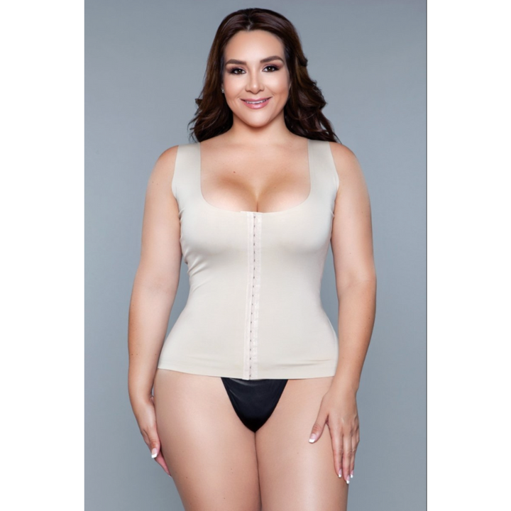 Model wearing seamless top bodyshaper with hook and eye closure in beige facing forward