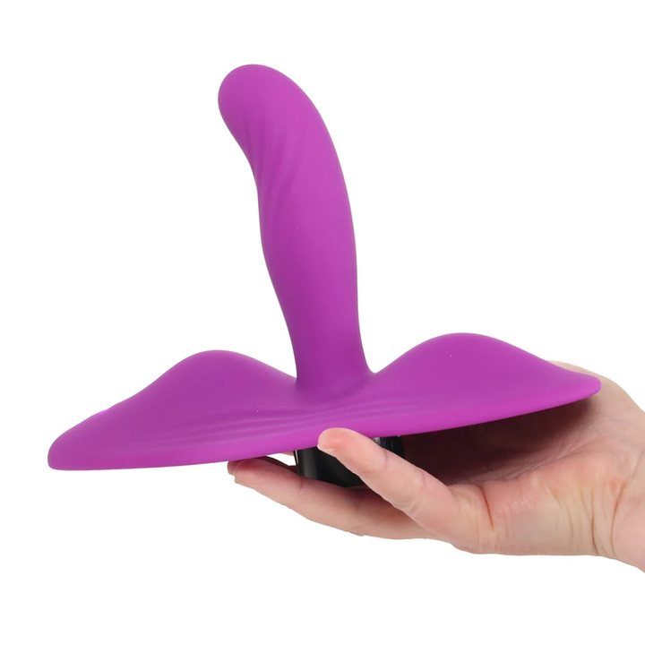 hand holding vibrating grinder from Bedroom Bliss Love Rider Vibrating Cushion 