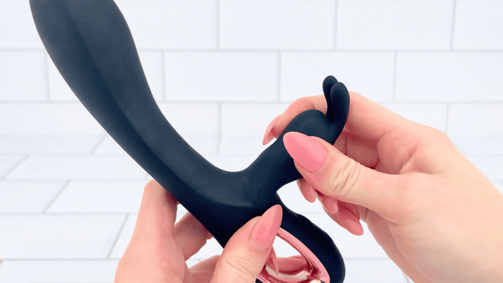 GIF of black silicone rabbit clit stimulator being flexed