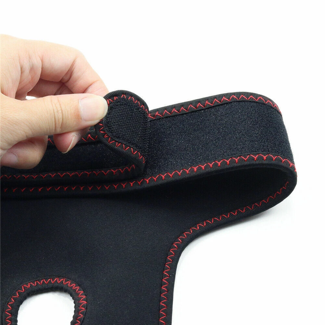 hand pulling velcro strap from 8.5 Inch Easy Strapon Set