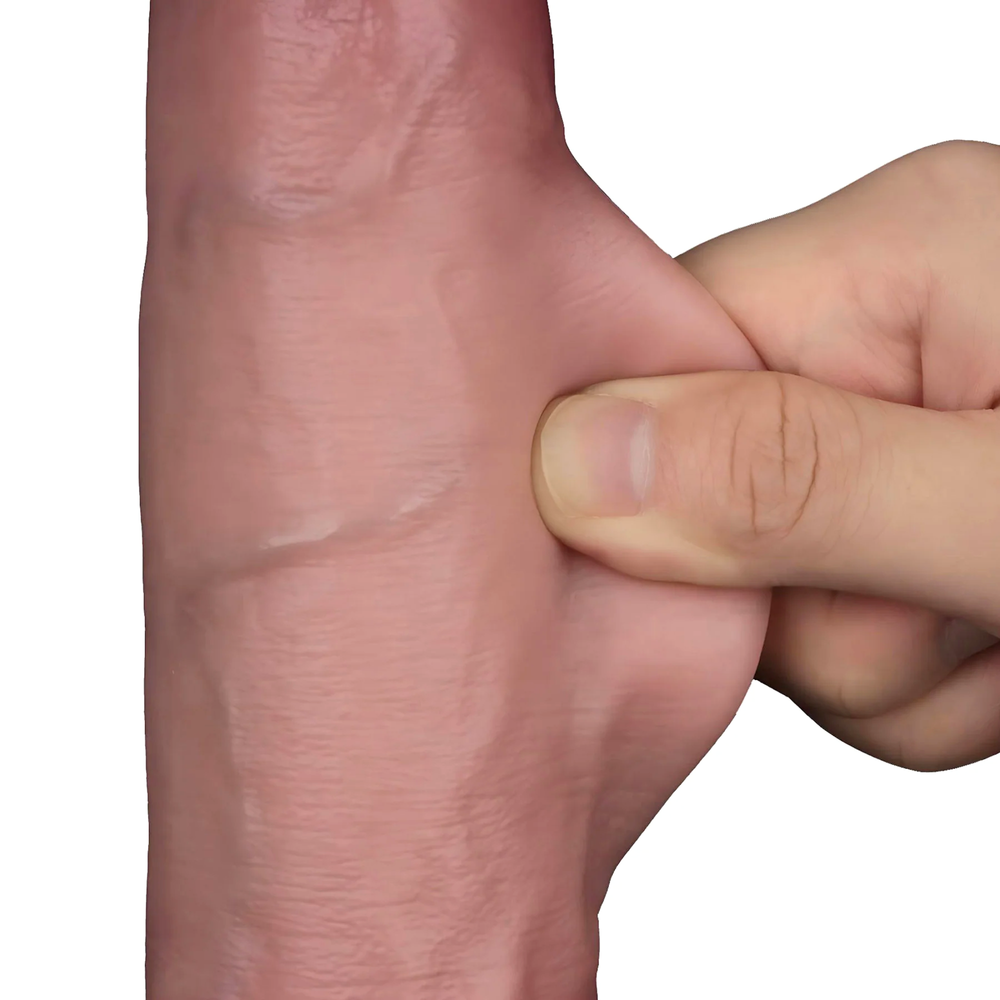 fingers pulling foreskin from beige 9 inch Sliding Skin Pro II Dual Layer Silicone Dildo 