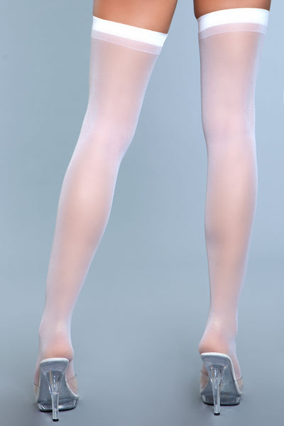 Sheer white thigh highs with band at top facing back