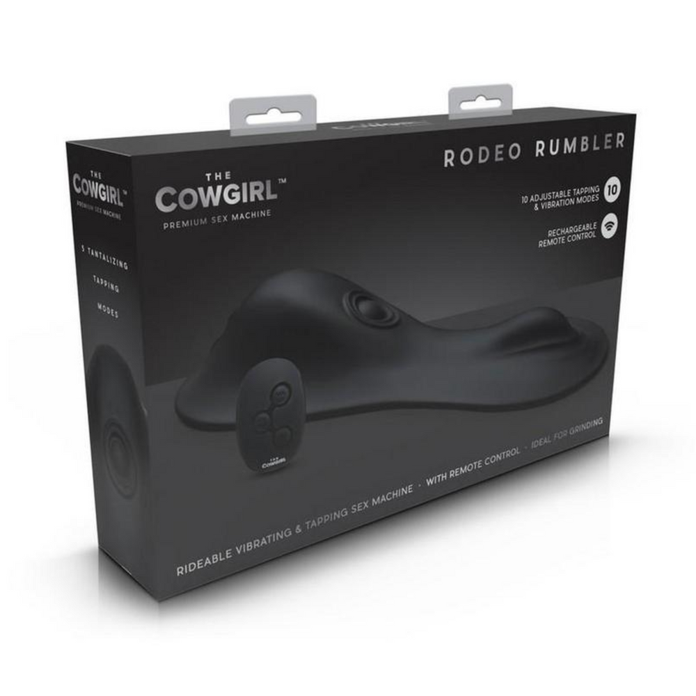 Cowgirl Rodeo Rumbler Grinding Vibrating Tapping Rechargeable Silicone Dildo as seen inside of packaging 