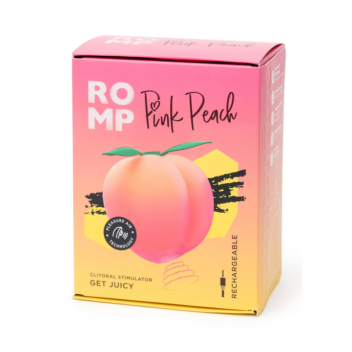 ROMP Pink Peach Rechargeable Clitoral Stimulator as seen inside of packaging 